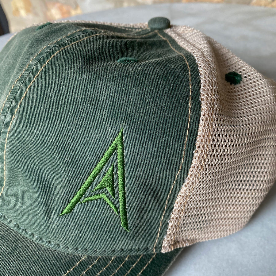 Embroidery detail on forest green of Arrow Vintage Trucker at ridebackwards.com