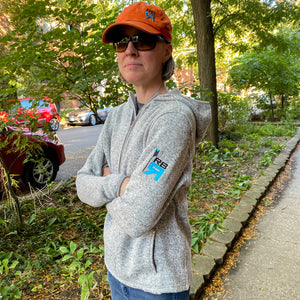RB Sweet Fleece on female model- polyester sweater fleece with hood, pockets and open hem. ridebackwards.com